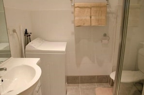 bathroom with washing machine