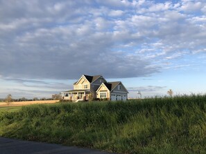 House is located on a corner of the owner's farm.  It is surrounded by farmland.