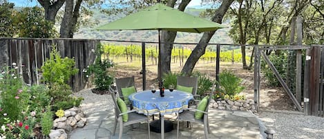 Enjoy a glass of wine or a morning coffee looking out over the vineyards.