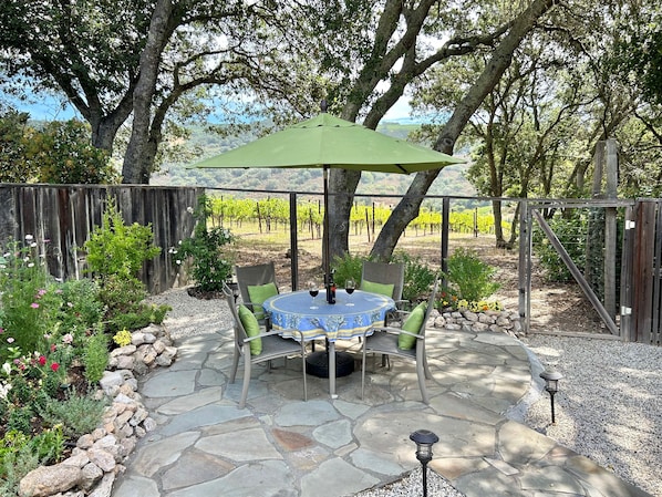 Enjoy a glass of wine or a morning coffee looking out over the vineyards.
