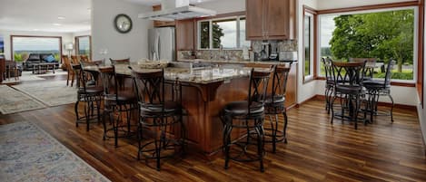 The range is wonderful, the island is HUGE, it’s open to the bar area - just perfect for a family gathering.  -Megan