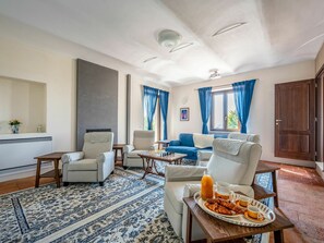 Table, Property, Furniture, Picture Frame, Houseplant, Azure, Interior Design, Comfort, Chair, Living Room