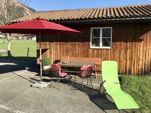 Property, Furniture, Plant, Building, Window, Shade, Table, Outdoor Table, Outdoor Furniture, Sky