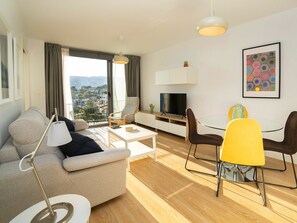 Living Room, Room, Property, Furniture, Interior Design, Floor, Wood Flooring, Building, Yellow, Real Estate