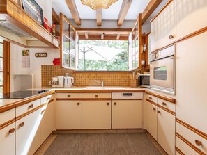 Cabinetry, Countertop, Property, Sink, Kitchen Sink, Kitchen, Wood, Kitchen Stove, Interior Design, Window