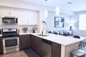 Large stone kitchen bar and countertopsOven, Stove, Microwave, Dishwasher, Refrigerator, Freezer, Washer/Drier, Toaster, Spices, Keurig Coffee Maker, Blender, Rice Maker, Pots, Pans, Silverware, Stemware, Glasses, etc.