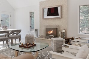 Reflectel TV over wood burning fireplace