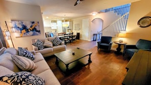 Open living room with 75 inch smart TV