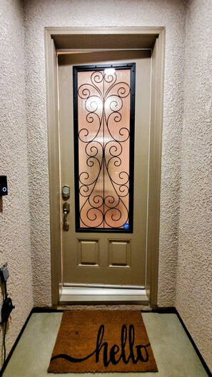 Front door with keyless entry, code provided prior to arrival