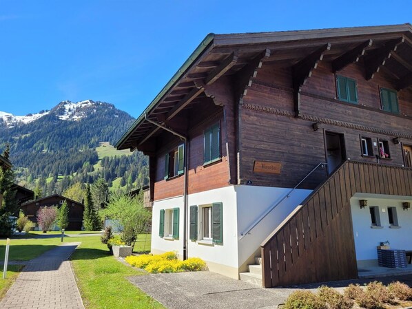 Plant, Sky, Property, Window, Mountain, Building, Tree, Land Lot, Wood, Grass