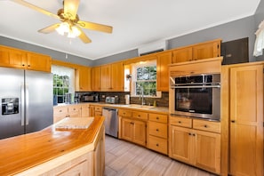 Full kitchen. Tons of cooking supplies.