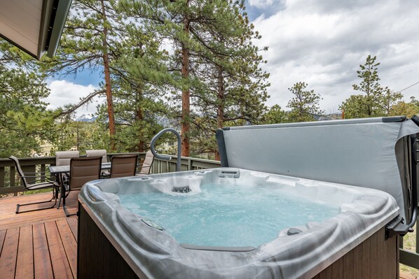 Relax in the spacious hot tub, enjoy views, BBQ and wildlife on the patio.