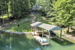 Private dock with kayaks and a paddle boat!
