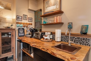 kitchen with custom redwood counter made by a local.