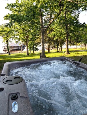 private hot tub on back patio. 