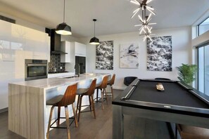Open lay out dining room area with Pool Table