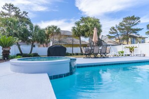 Cocktail pool has a waterfall edge