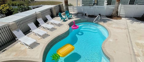 Massive Pool!  Plenty of loungers for everyone along with chairs and tables.  