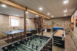 GAME ROOM: Optional Add-On Amenity. Located adjacent to the farm house. Please inquire for pricing, you can add on at anytime during your stay.