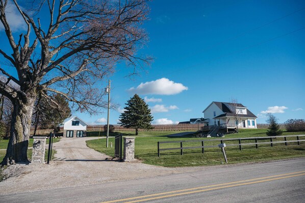 On a gated property of the Yuba Vineyards, you'll have a Farm House experience with privacy, space, and sunsets over the East Arm of the Grand Traverse Bay.