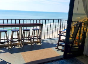 Sliding glass doors to balcony open double wide from the center