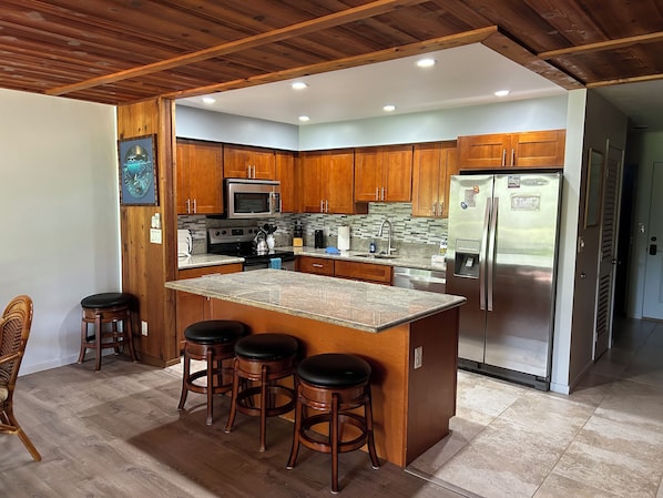 Granite counter tops throughout kitchen-lots of storage