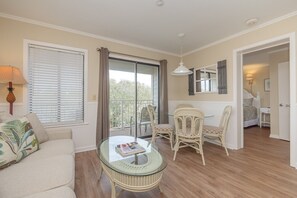 Carolina Beach Club 326 - Living Room - Living/Dining area leads to lovely balcony with sliding glass door.
