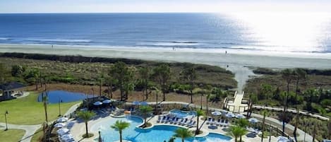 Carolina Beach Club - 326 - Pool - Ariel view of beach and Hilton Ocean Oaks oceanfront pool.  Carolina Beach Club has access to the resort's amenities.