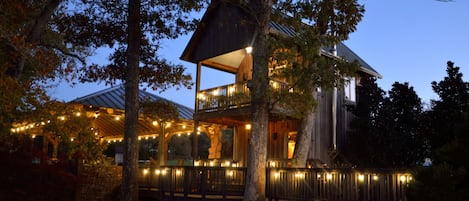 Lakeview Cabin at night with string lights.