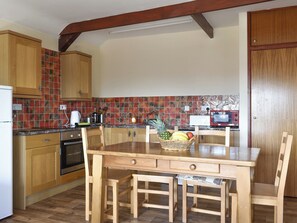 Fully appointed kitchen with convenient dining area | Owl&rsquo;s Roost - Trentinney Farm Holiday Cottages, St Endellion, near Port Isaac