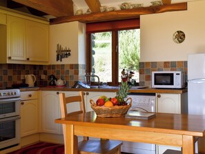 Open plan living space | Round House - Trentinney Farm Holiday Cottages, St Endellion, near Port Isaac