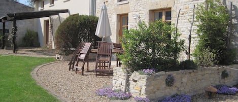 Terrace areas of cottages open out onto the shared gardens