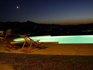 Pool and garden is lit at night - enjoy the twinkling lights across the valley