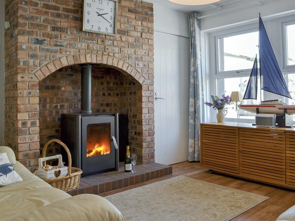 Charming living room with wood burner | Captains Cottage, Allonby, near Maryport