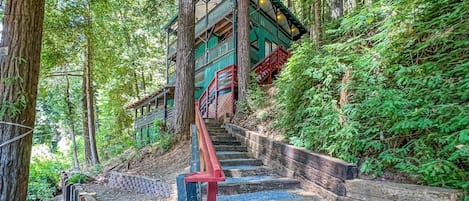 view of cabin and stairs