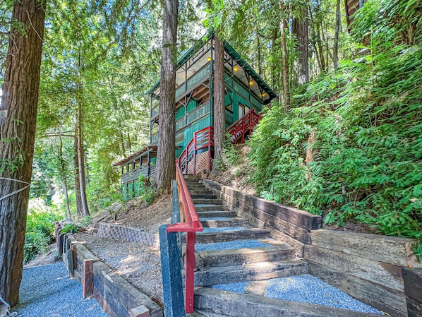 view of cabin and stairs