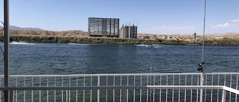 180 degrees view of river to enjoy the sight and sound of river activities . 