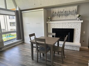Natural gas fireplace with queen murphy bed