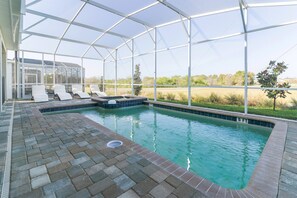 Private pool area, launge chairs and patio furniture