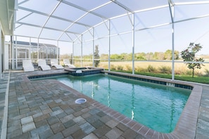 Private pool area, launge chairs and patio furniture