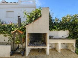 Plant, Sky, Window, Wood, Outdoor Furniture, Shade, Table, Building, Rectangle, Landscape