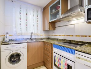 Laundry Room, Cabinetry, Property, Countertop, Clothes Dryer, Washing Machine, Kitchen, Kitchen Appliance, Kitchen Stove, Home Appliance