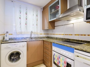 Laundry Room, Cabinetry, Property, Countertop, Clothes Dryer, Washing Machine, Kitchen, Kitchen Appliance, Kitchen Stove, Home Appliance