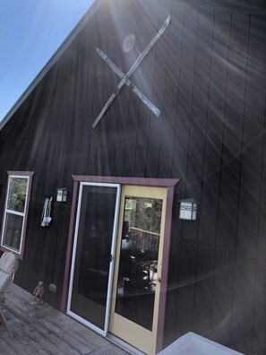 Second story deck is accessible via french doors.