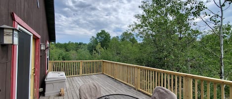 Second story deck facing towards the river and overlooking the state forest