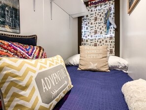 Twin bed for either a child or adult on the main floor. 
