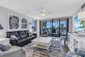 LR with full access sliders to the lanai with power shades.