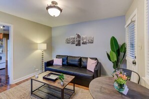 Your living room with the main door entrance to the right. Some more Elvis frames on the walls