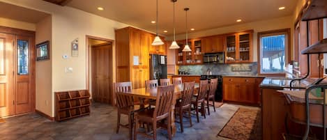 Front door on the left, kitchen and dining on the right