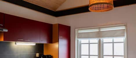Cabinetry, Countertop, Wood, Table, Building, Lighting, Orange, Window, Interior Design, Floor
